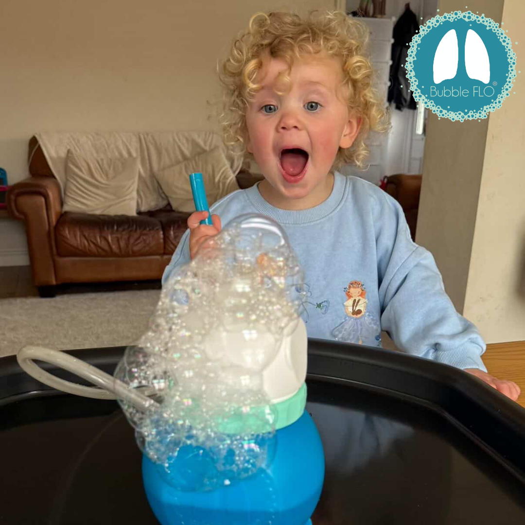 Child using a Bubble FLO® respiratory device